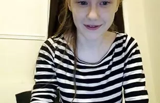 video porn In front of your eyes she spreads her legs and fingers her young cunt